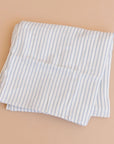 Striped fabric on a beige background
