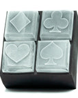 Clear plastic playing card boxes with suits on a white background