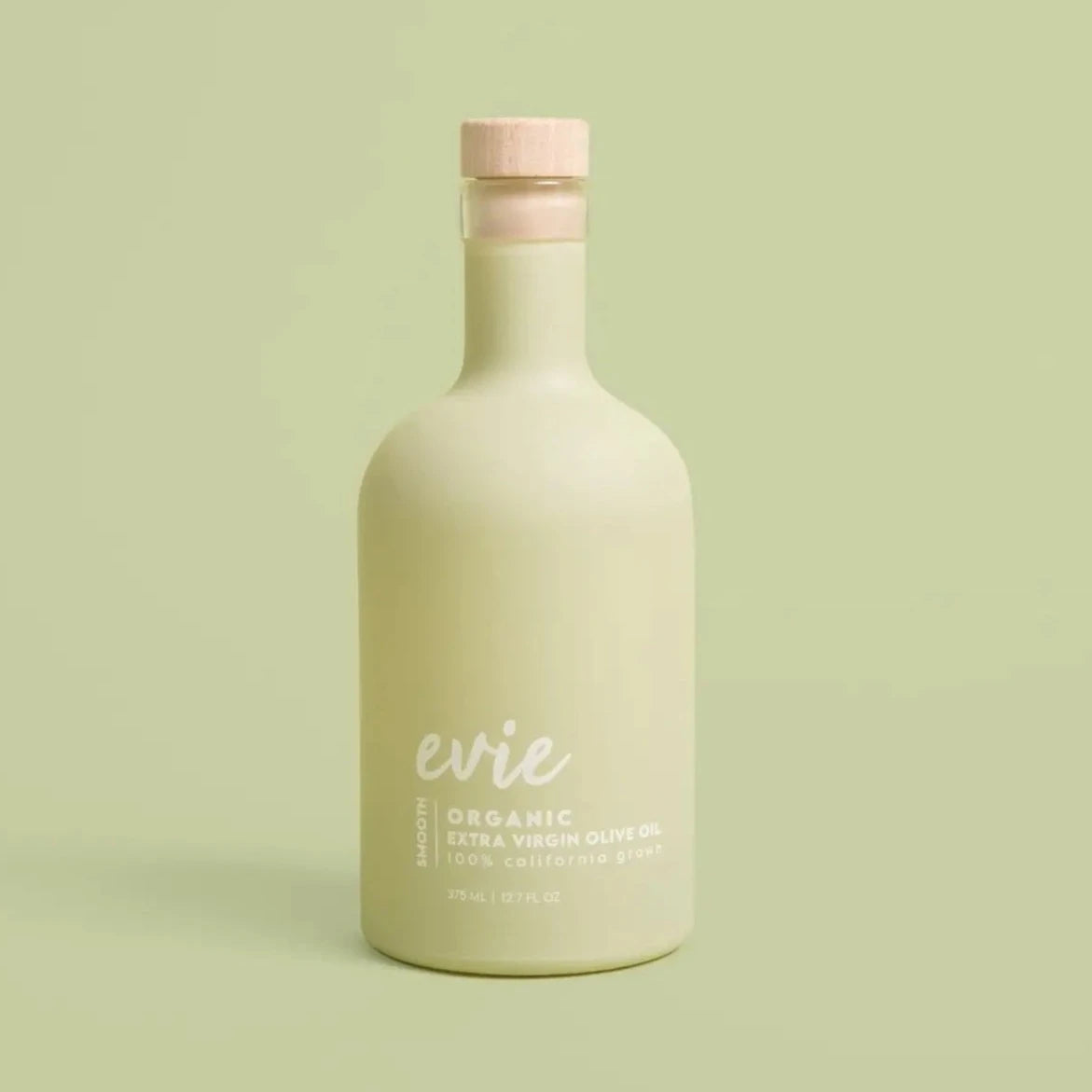 sage green olive oil bottle with wooden top