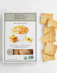 Box of Rustic Bakery organic sourdough flatbread bites with crackers on a white background