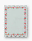 Notepad with floral border on a white background