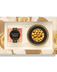 Chocolate gift set with 'Champagne Bears' and 'Gold Chocolate Caviar' in a decorative box.
