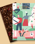 Dark chocolate bar with a festive-themed packaging on a beige background