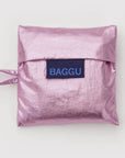 Pink reusable bag with 'BAGGU' logo on a white background