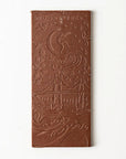 Chocolate bar with 'Moonstruck Chocolate' branding on a white background