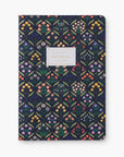 blue patterned notebook on a white background