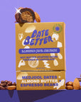 Box of 'Date Better' Almond Java Crunch on a purple background with ingredients visible