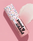 Pop & Poppy product with colorful sprinkles on a pink background