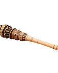 A carved wooden mizmar or prayer wand with intricate geometric engravings and a smooth, tapered handle, shown on a plain white background.