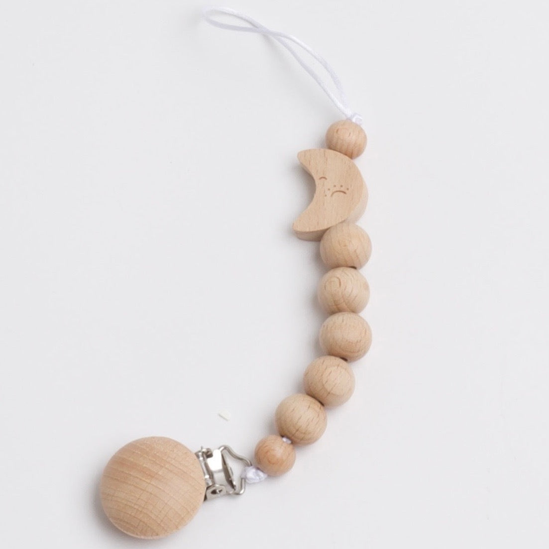 Wooden teether clip with moon.