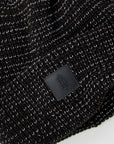 Black fleece beanie close up