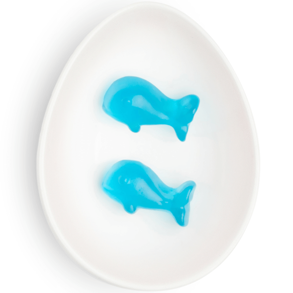 blue whale gummies in white oval dish