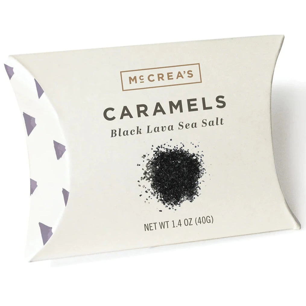 White envelope packaging with black sea salt image on front.