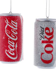 Decorative Christmas ornaments shaped like Coca-Cola and Diet Coke cans on a white background