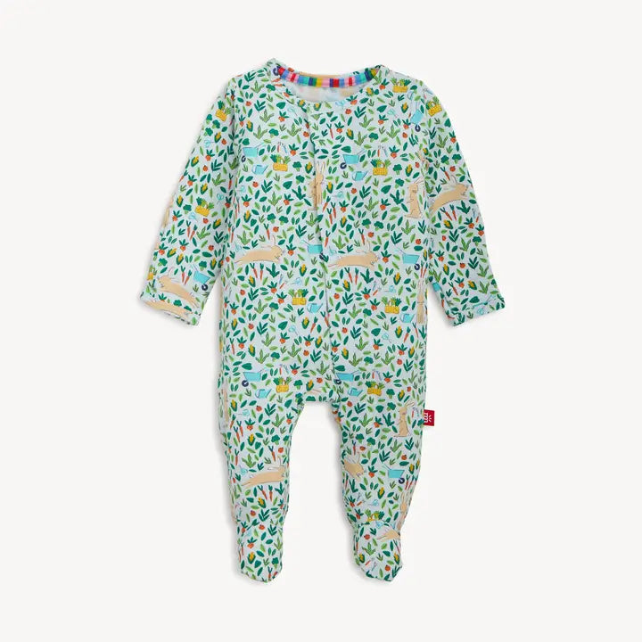 Children's onesie with a colorful animal pattern on a white background