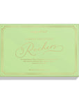 A rectangular box of Rochers Parisian Chocolates by Ingallsina, featuring a light mint green background with elegant gold foil borders and cursive branding, set against a clean white background.