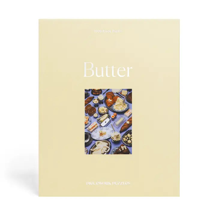 Book titled 'Butter' with a cover featuring images of butter products on a beige background