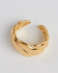 Gold Croissant Ring on white background