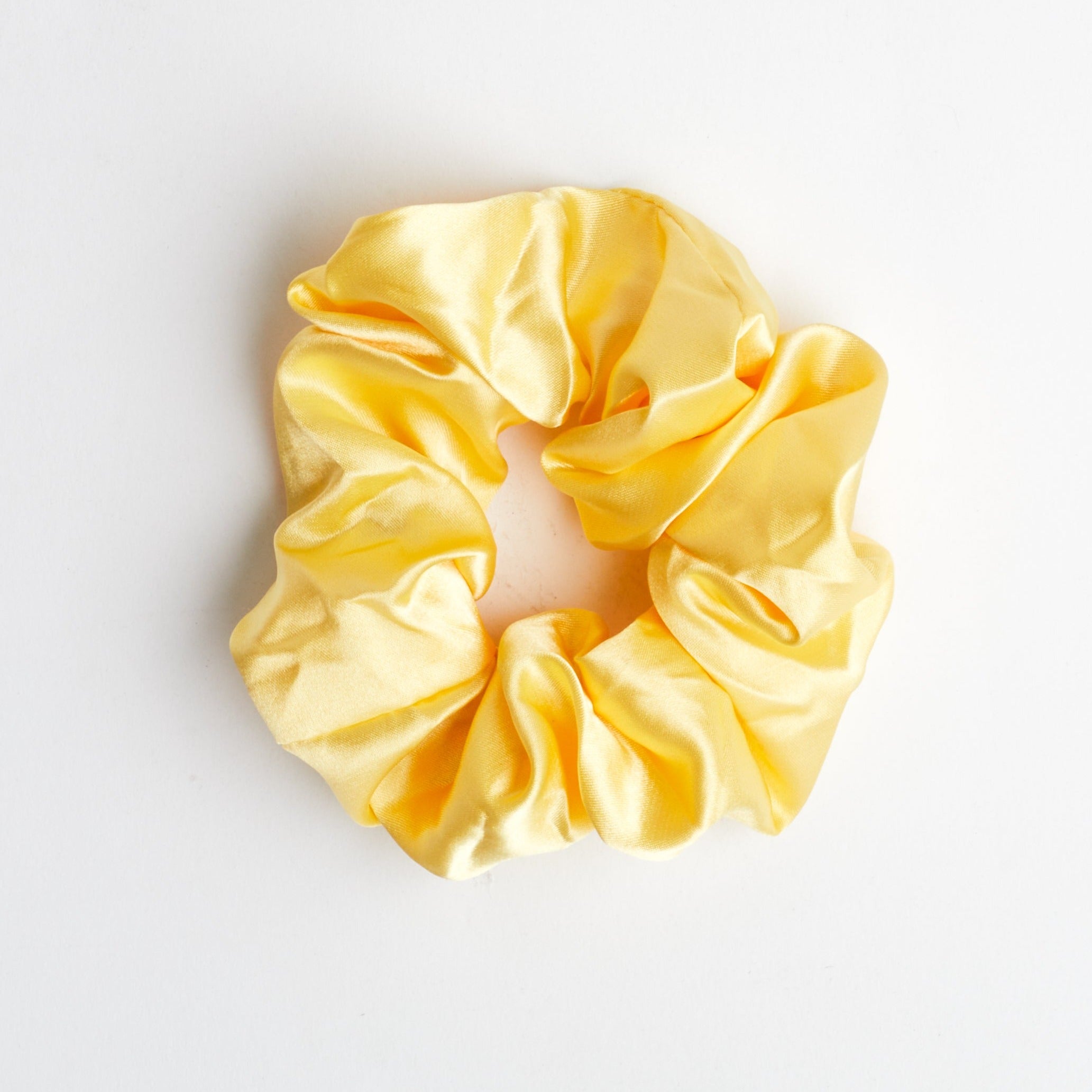 Single Butter Yellow Satin Thick Scrunchie on white background