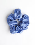 Single Cornflower Blue Satin Thick Scrunchie on white background