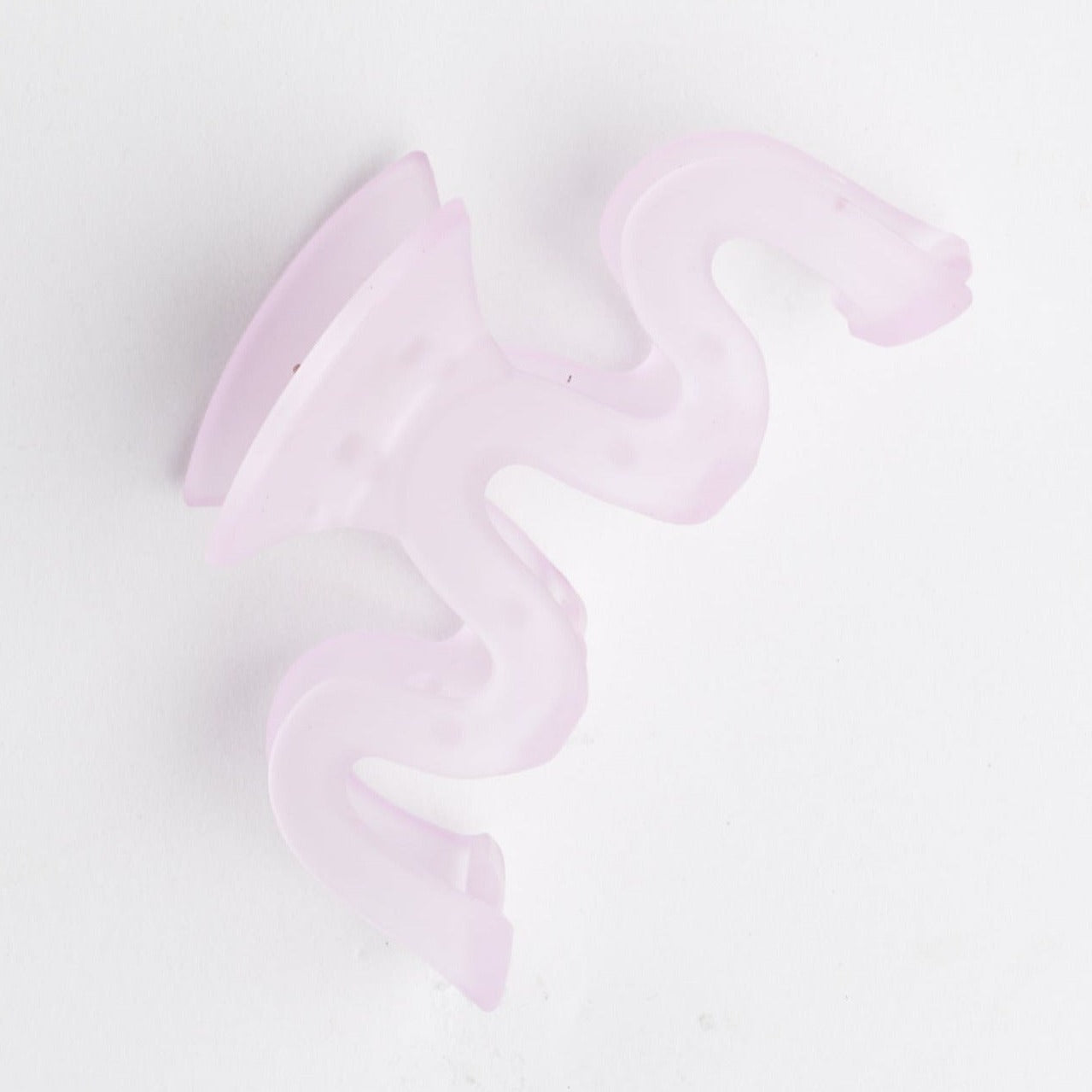 Pink Squiggle Hair Clip on white background