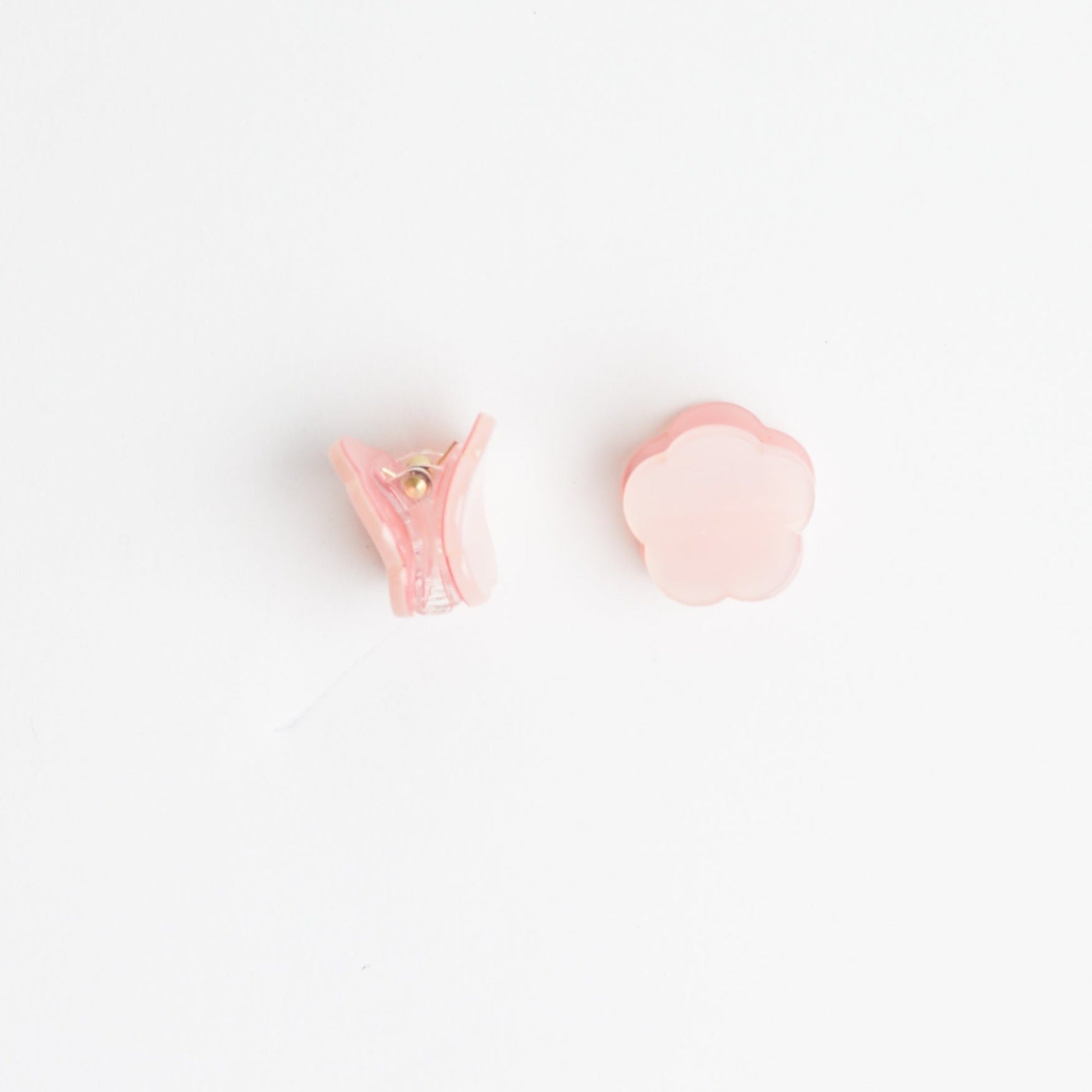 Pink Mini Flower Hair Clips | Set of 2 on white background.