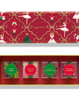 Sugarfina Christmas-themed gummy candy gift set in an open gold-trimmed red box, with the matching lid shown above. The lid features a festive red pattern with ballerinas, nutcrackers, gold ribbons, and a Christmas tree.