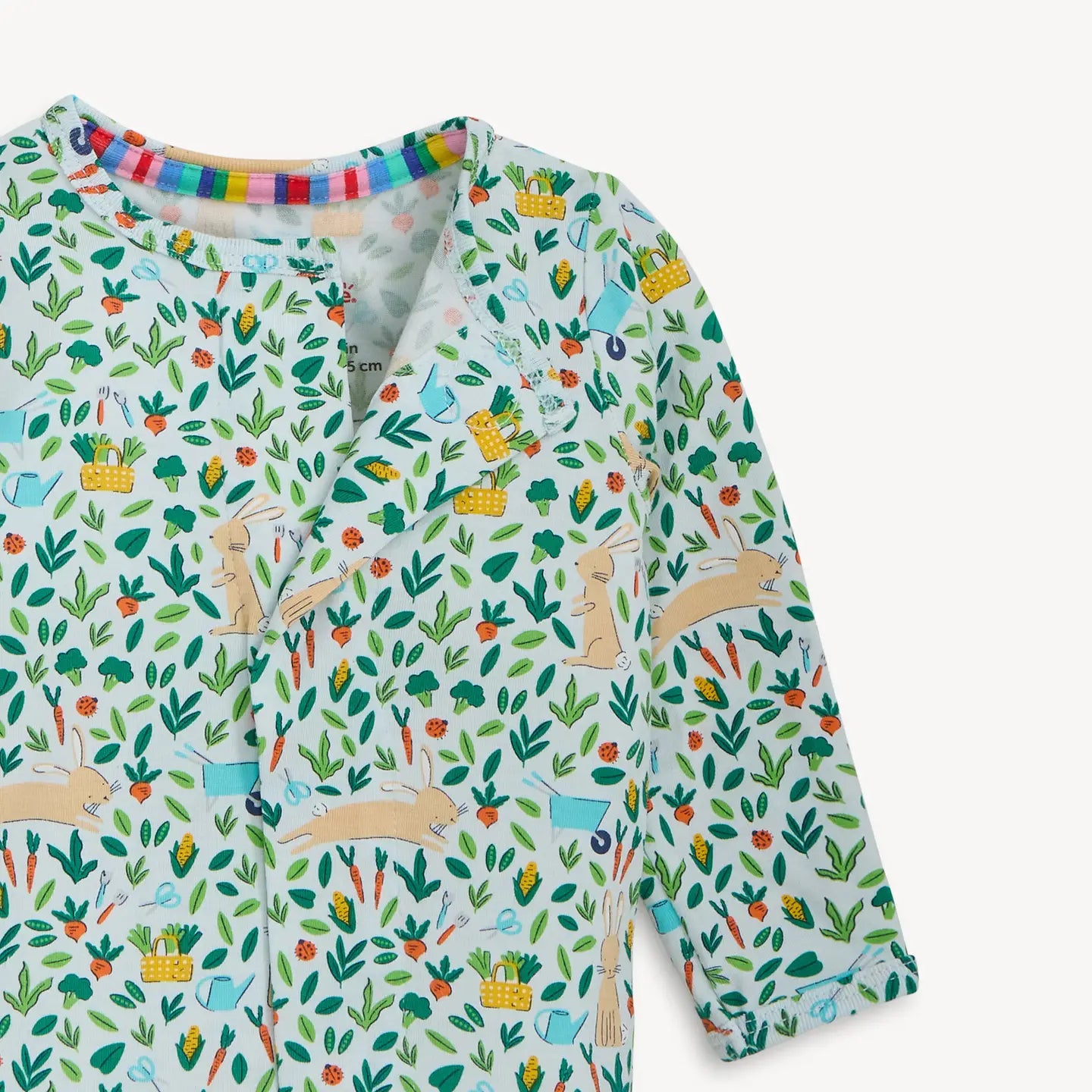 Children's long-sleeve shirt with a colorful animal pattern on a white background