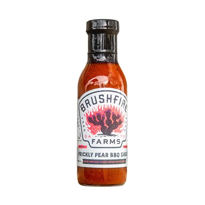 Bottle of Brushfire Farms Prickly Pear BBQ Sauce on a white background