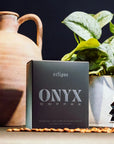 black onyx eclipse coffee packaging with embossed silver print