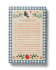 Notepad with a checkered border and farm-themed design on a white background