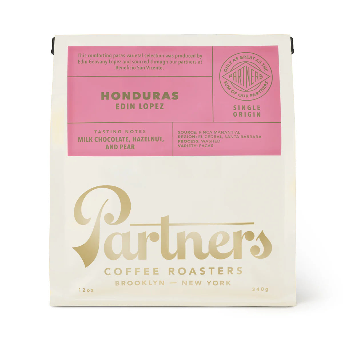 Coffee packaging from Partners Coffee Roasters with pink and gold design