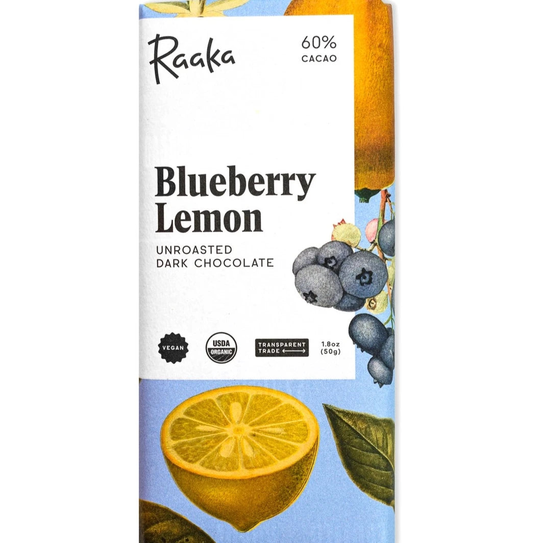 chocolate bar wrapped in blue packaging with lemons and blueberries illustrated on it 