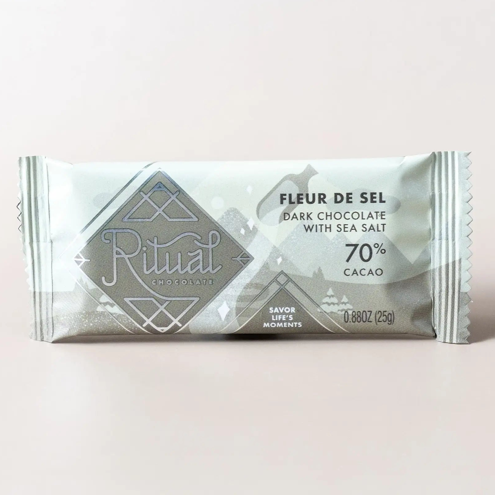 Bar of soap with 'Fleur de Sel' branding on a light pink background