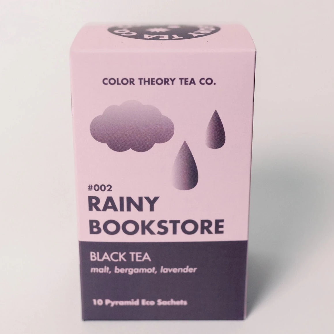 purple tea box with a cloud and raindrops on it