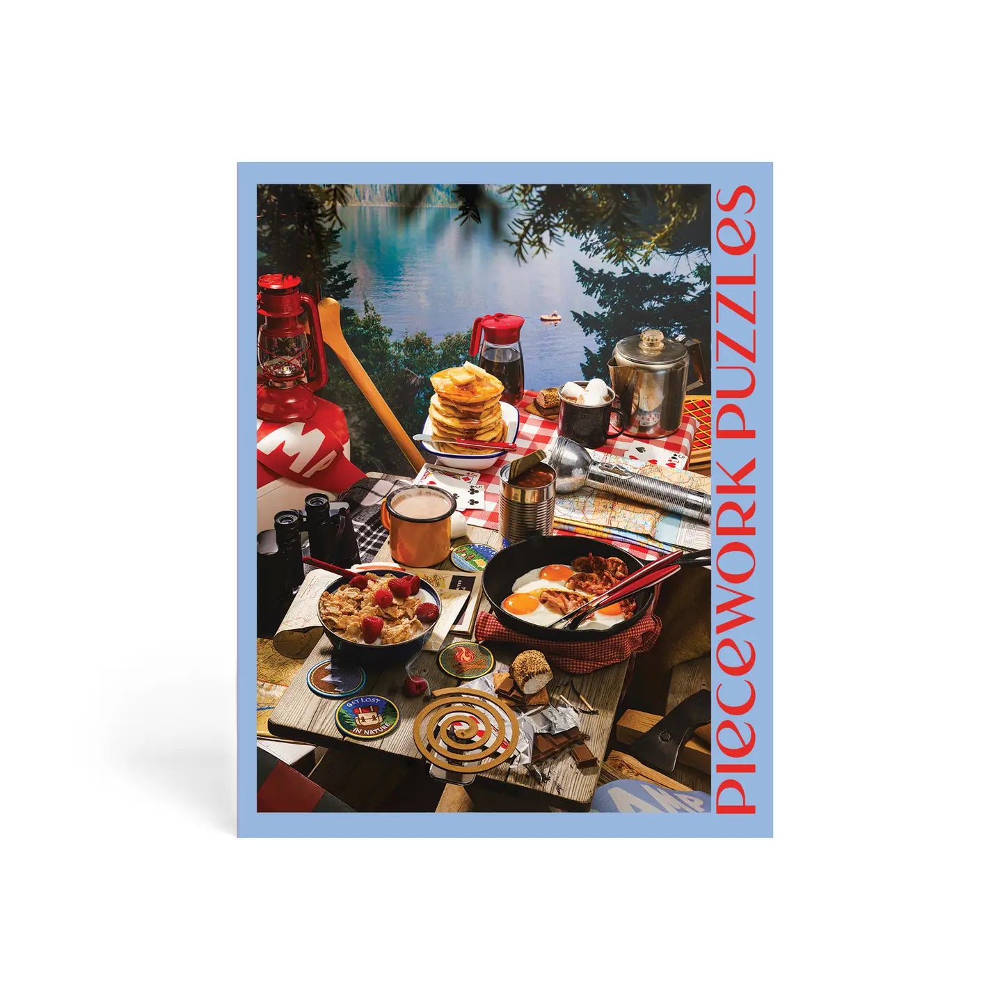 Jigsaw puzzle box with a scenic outdoor breakfast setup and 'Piecedwork Puzzles' branding.