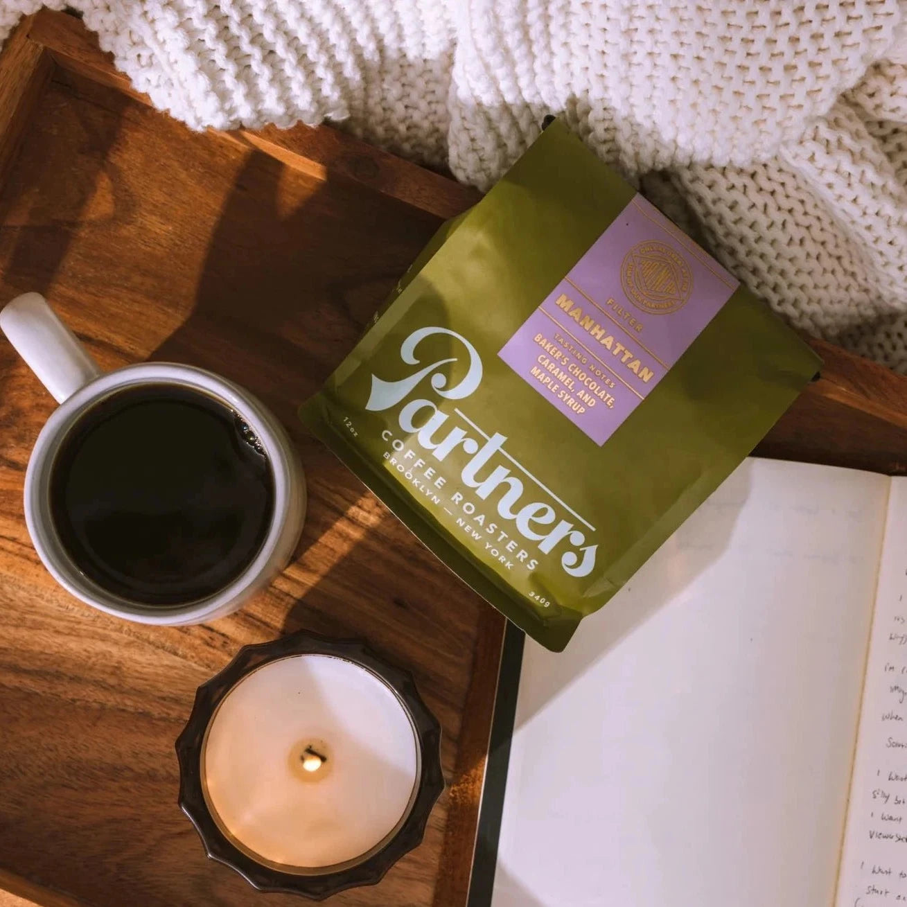 green coffee bag on desk tray