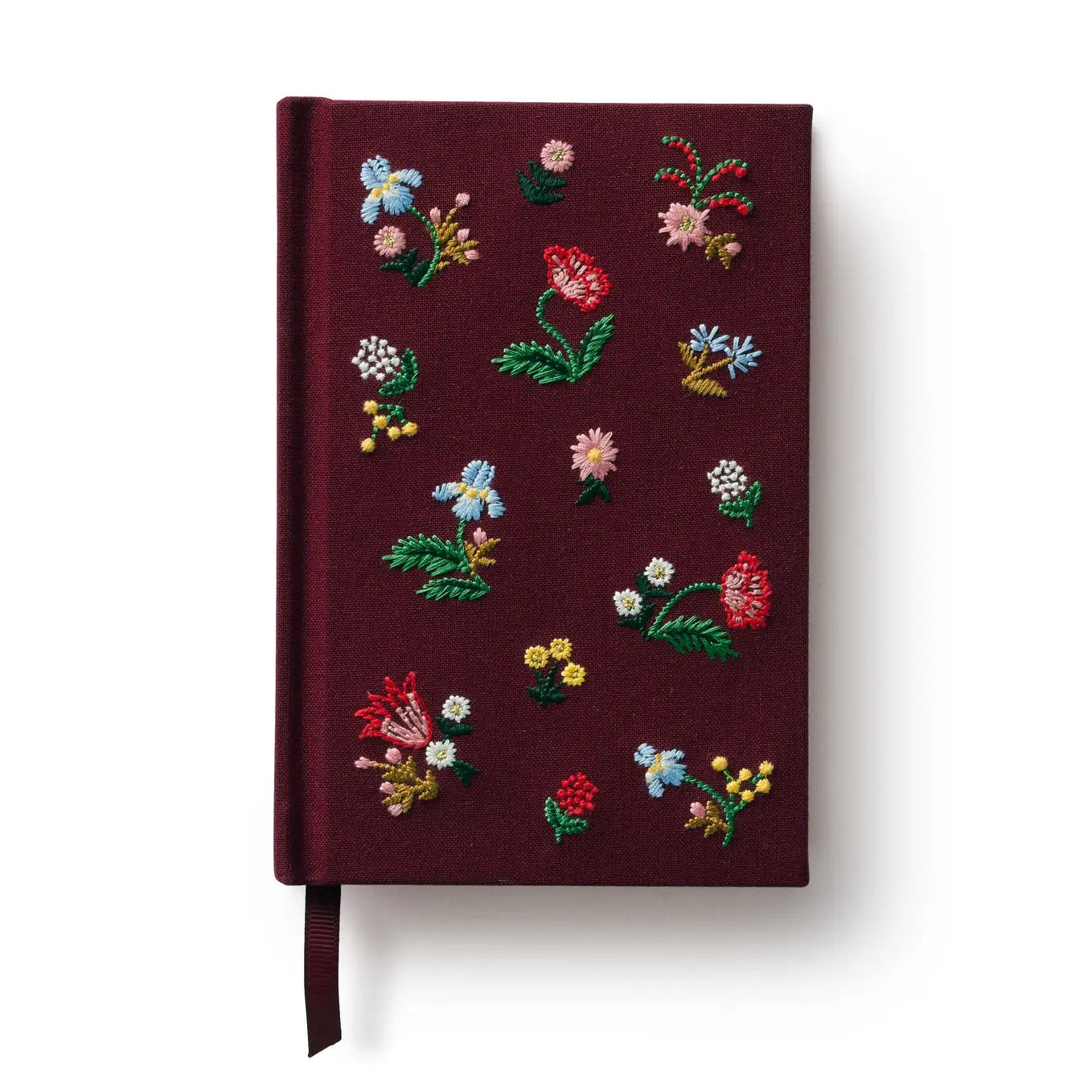 Maroon notebook with floral embroidery on a white background