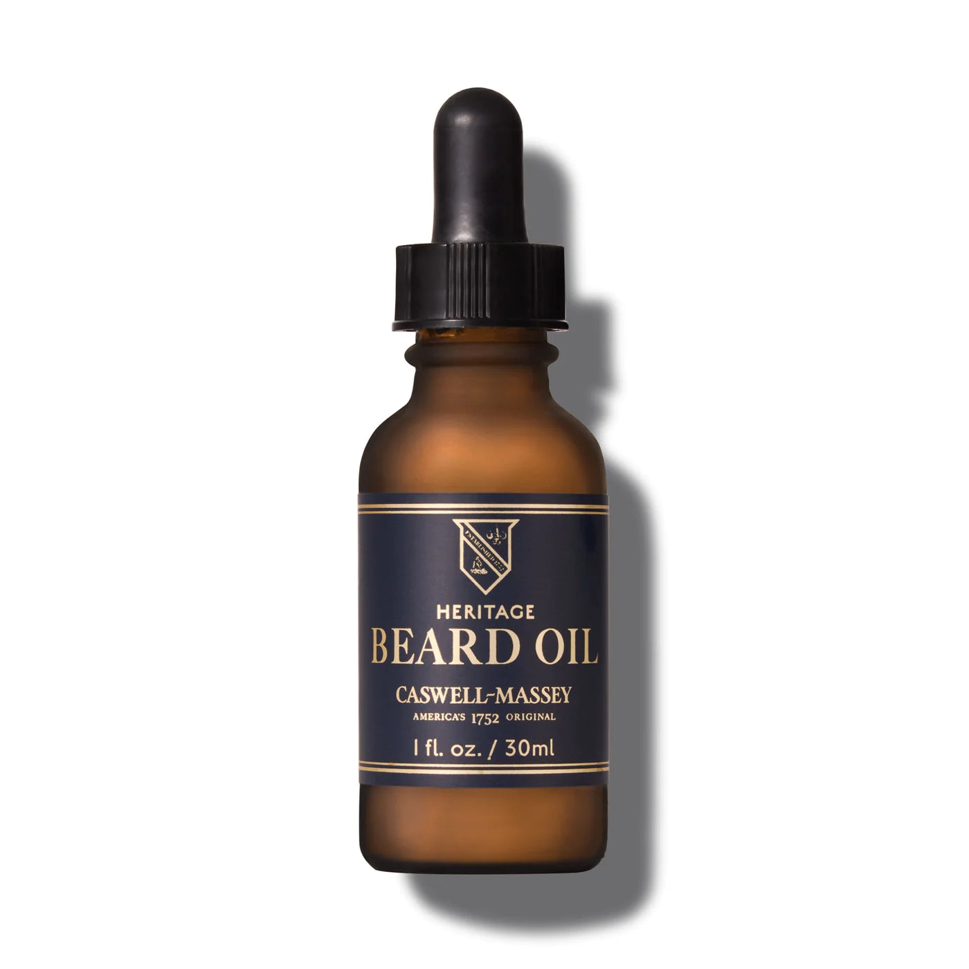 Beard oil bottle on white
