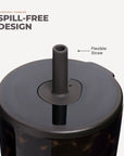 Close-up of a tumbler with a dark flexible straw and lid, labeled 'Flexible Straw' with text reading 'SPILL-FREE DESIGN' and 'EVERYDAY TUMBLER' on a light beige background.