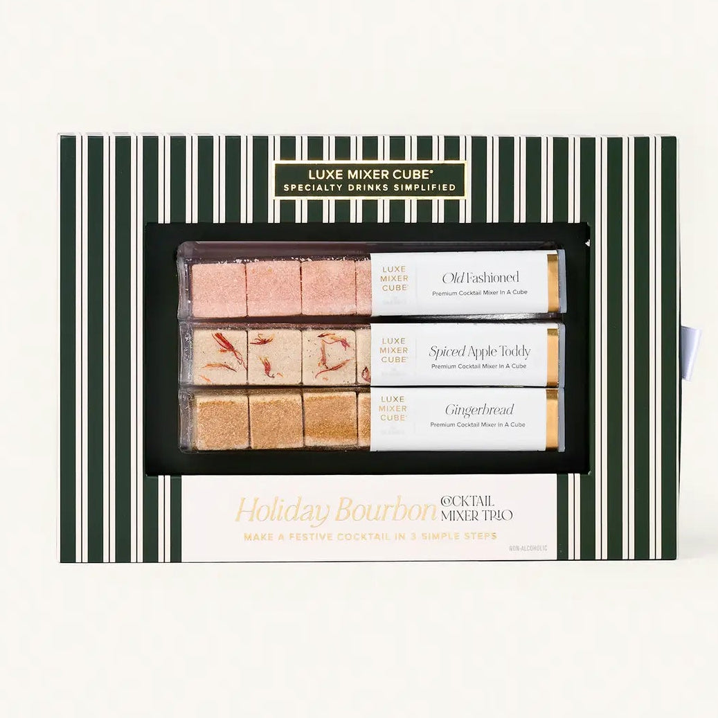 Luxury mixer cube set in a striped packaging on a white background