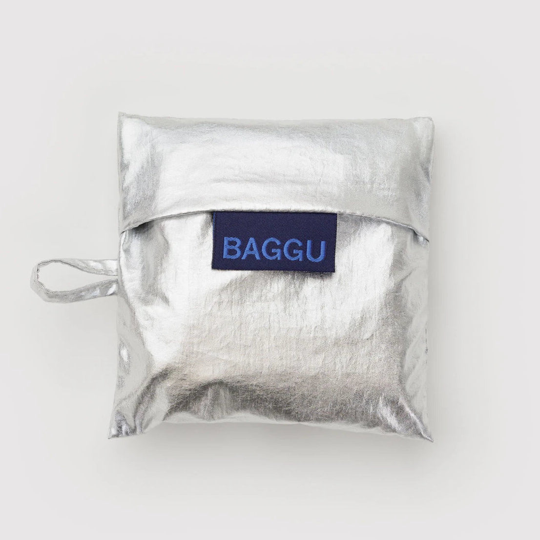 Silver reusable bag with 'BAGGU' label on a white background