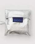 Silver reusable bag with 'BAGGU' label on a white background