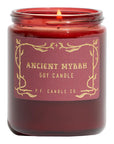 Red candle with a label reading 'Ancient Myrrh Soy Candle' from P.F. Candle Co.
