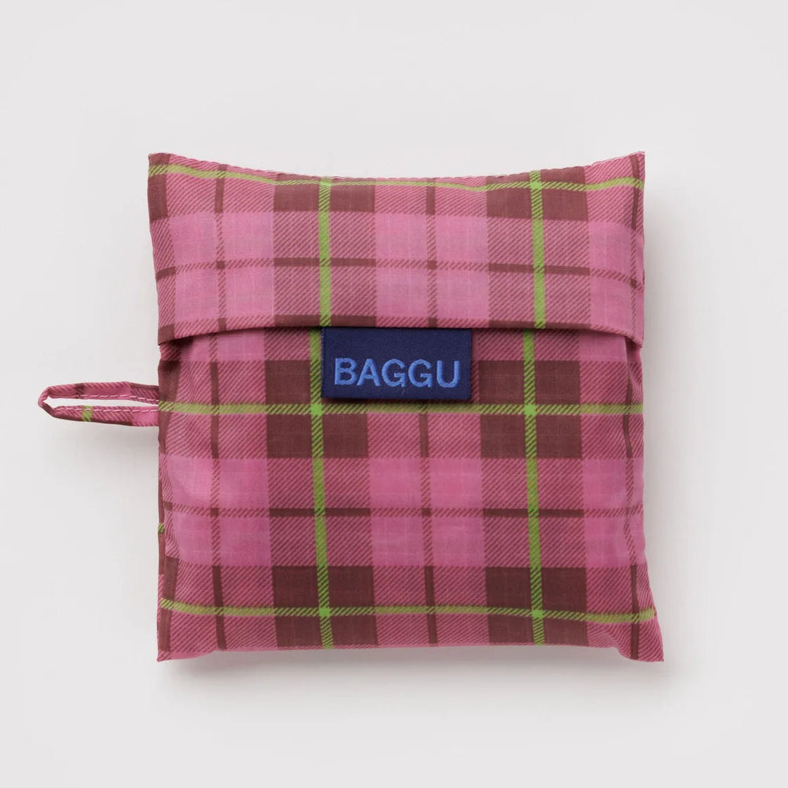Pink plaid reusable bag with 'BAGGU' logo on a white background