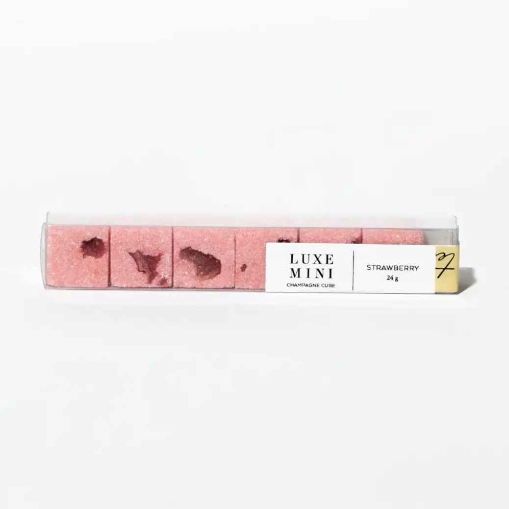 Pack of Luxe Mini strawberry champagne cubes on a white background