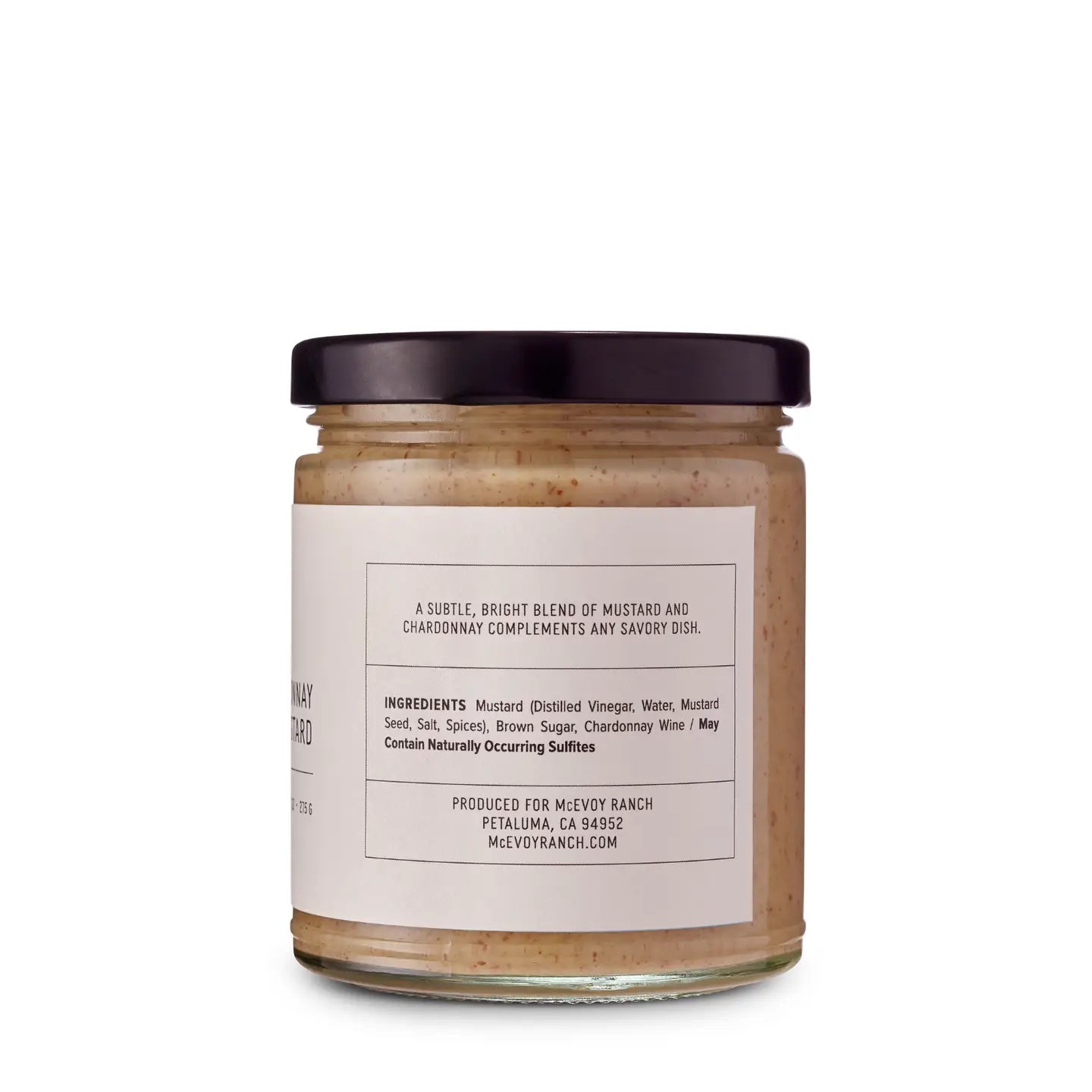 Jar of mustard with a label on a white background