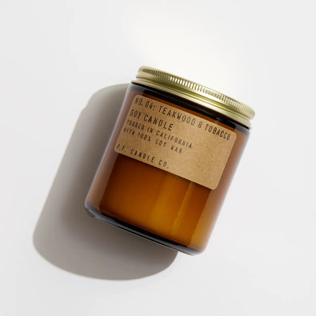Candle with a label on a white background