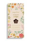 sugarfina Hazelnut Creèpe chocolate bar packaging with floral design on a white background