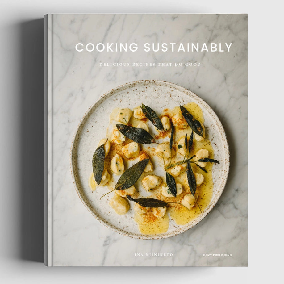 cover of Cooking Sustainably with photo of pasta dish with basil